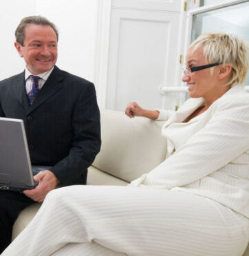 two business people who know each other meeting and discussing requirements 